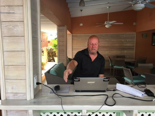 John does some writing work in Bridgetown, Barbados.