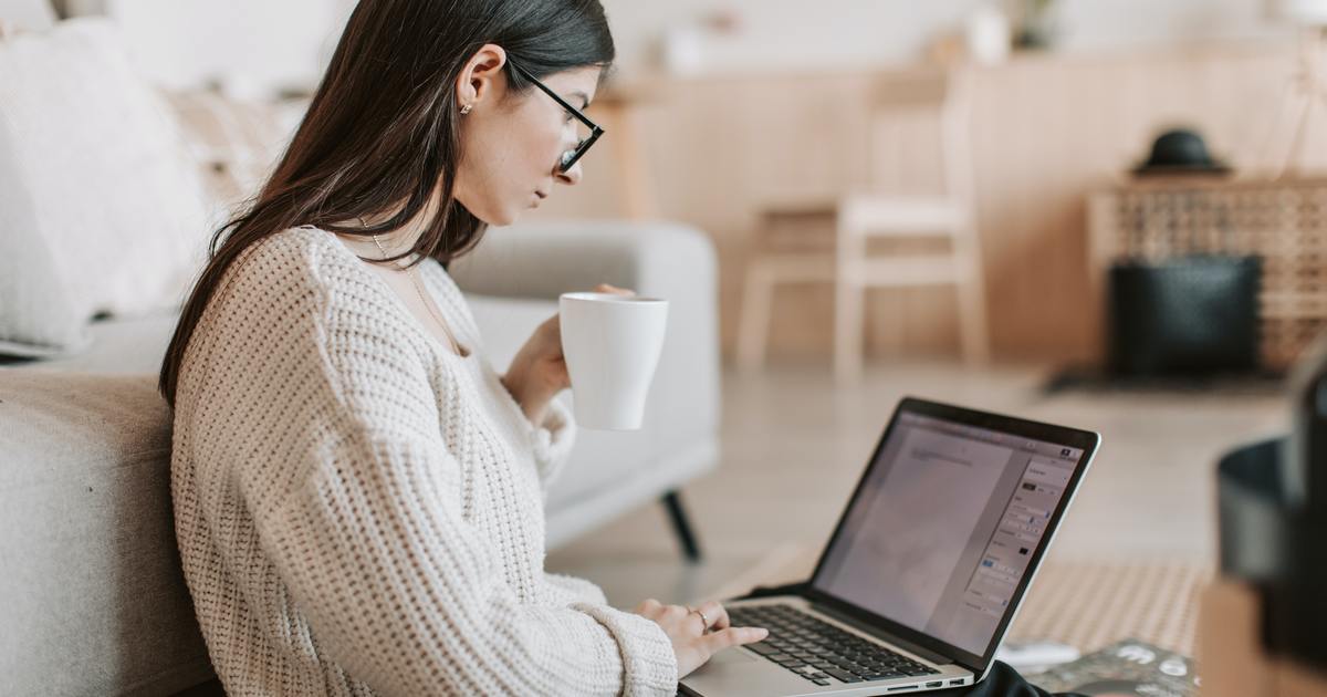 Woman typing on a laptop